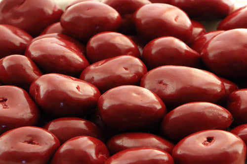 Cherries covered in a sweet milk chocolate confection.