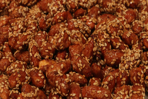 Our premium almonds with a honey sesame glaze.