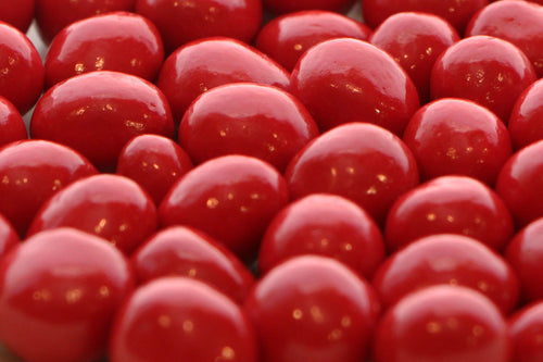 Cranberries coated in a sweet chocolate confection.