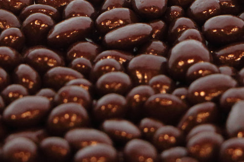 Dark chocolate coated raisins.