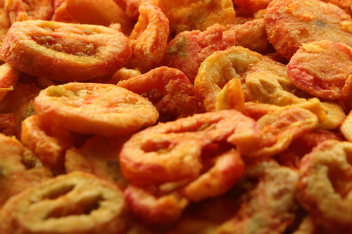 Tomatoe slices cooked to a crisp salty perfection.
